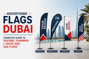 Advertising flags Dubai — feather teardrop L-shape and sail flags printed on knitted polyester and satin by Zahrat Al Madina Printing Umm Ramool