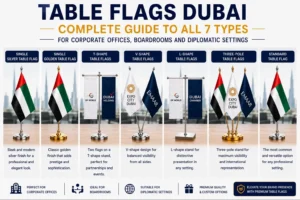 Table flags Dubai — all 7 types including single silver, golden, T-shape, V-shape, L-shape and three-pole desk flags for offices and boardrooms UAE